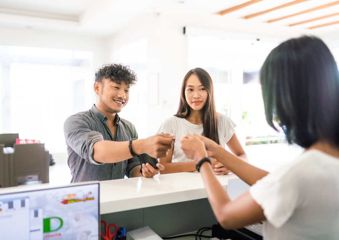 Customers paying the bill at the hospital counter